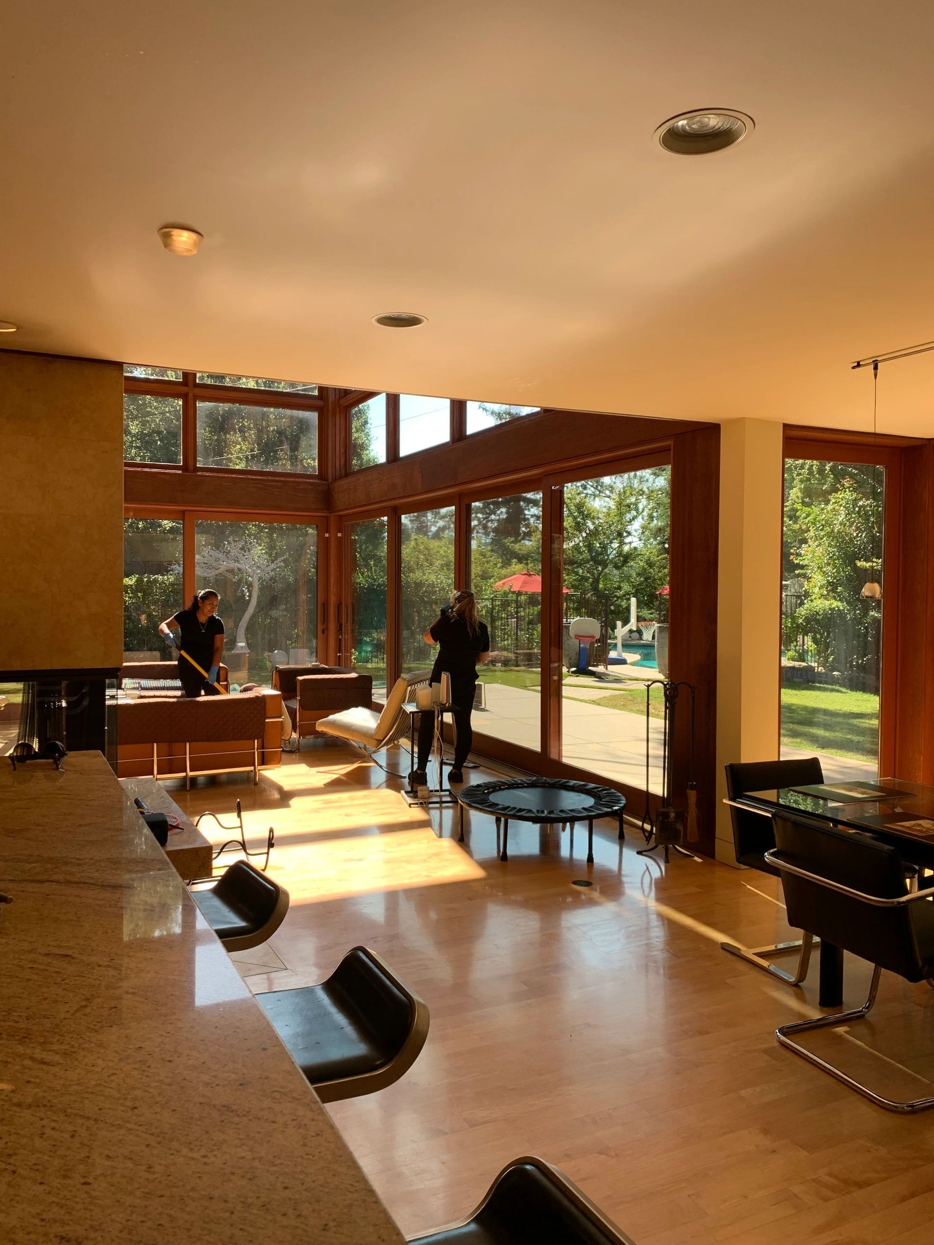 Bright modern living room with warm wood tones and natural light