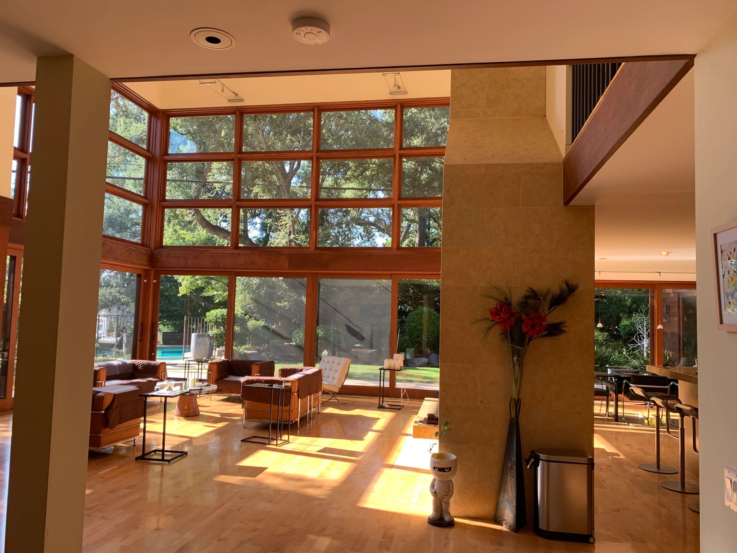 Spacious mid-century living room with floor-to-ceiling windows